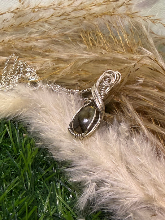 Labradorite pendent wrapped in 9.25 Serling silver