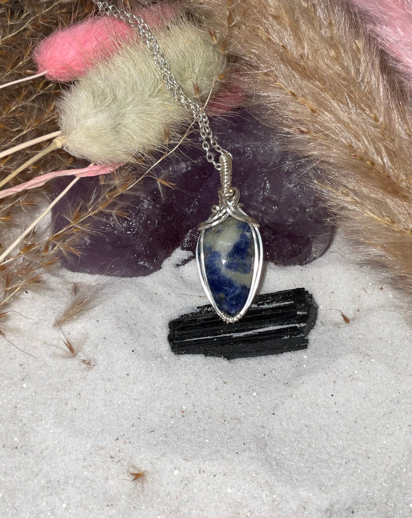 Sunset Sodalite wrapped in Sterling Silver