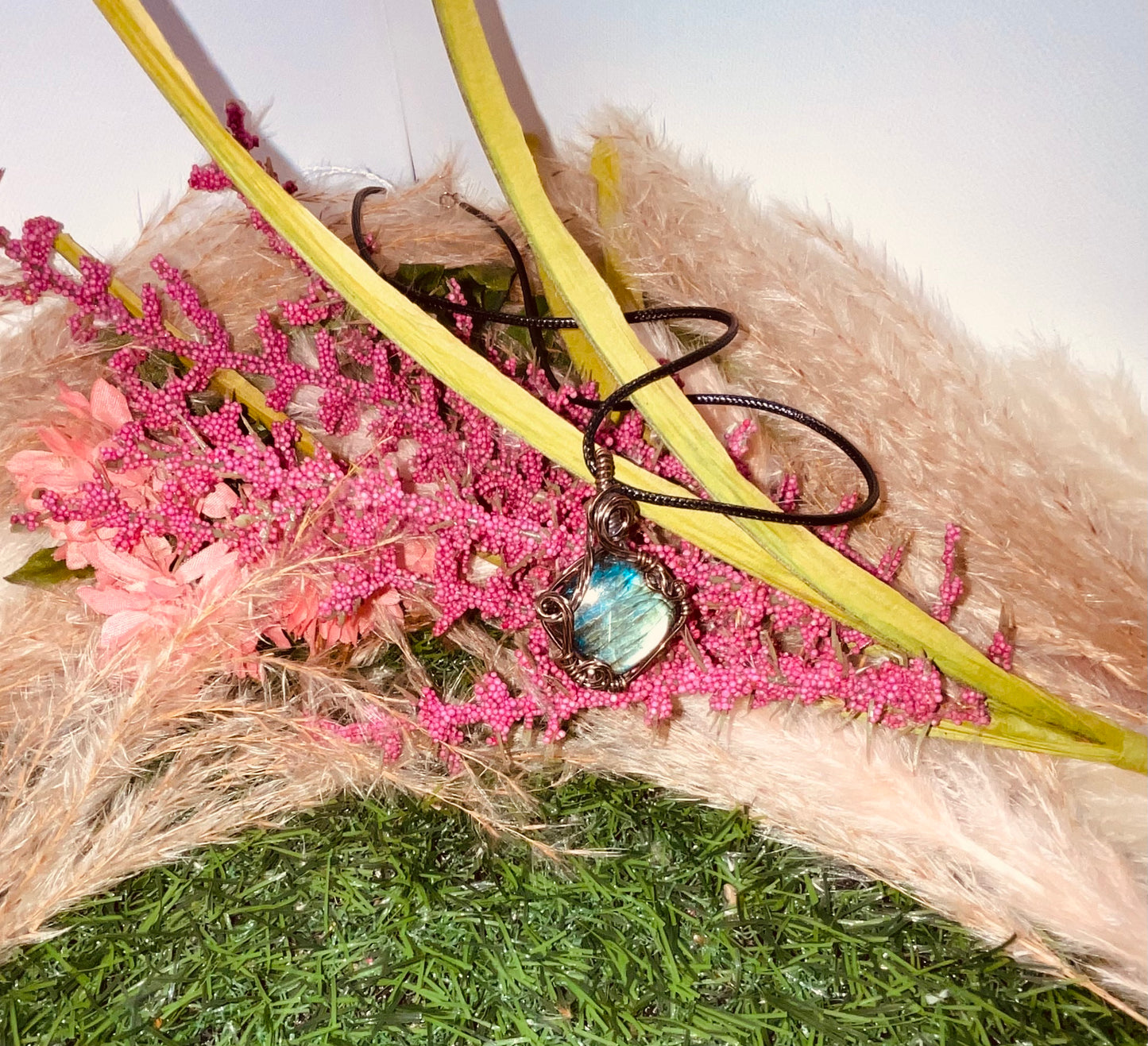 labradorite wrapped in Oxidized copper