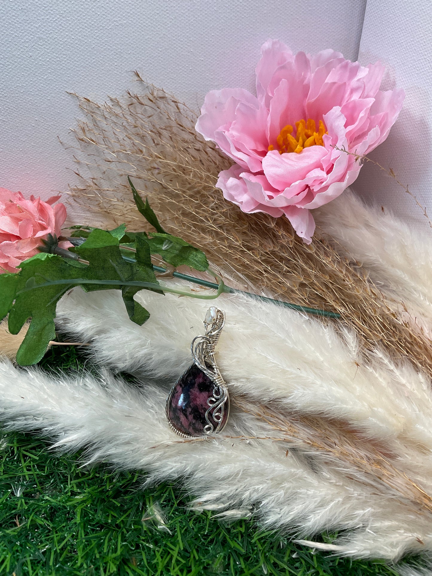 Rhodonite Gemstone wrapped in Sterling Silver