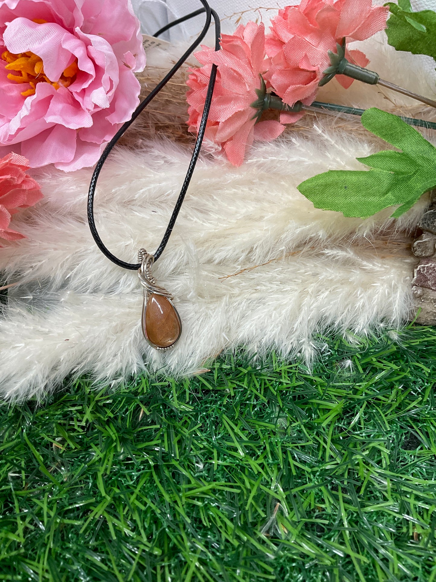 Sunstone Wrapped in Sterling Silver