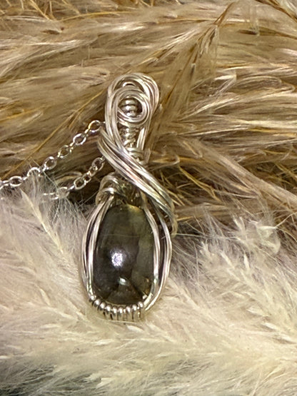 Labradorite pendent wrapped in 9.25 Serling silver