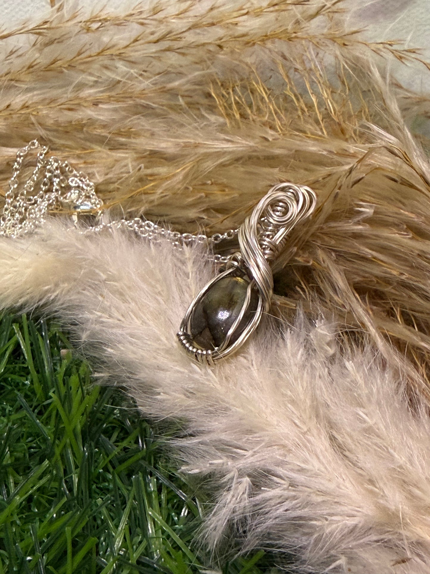 Labradorite pendent wrapped in 9.25 Serling silver