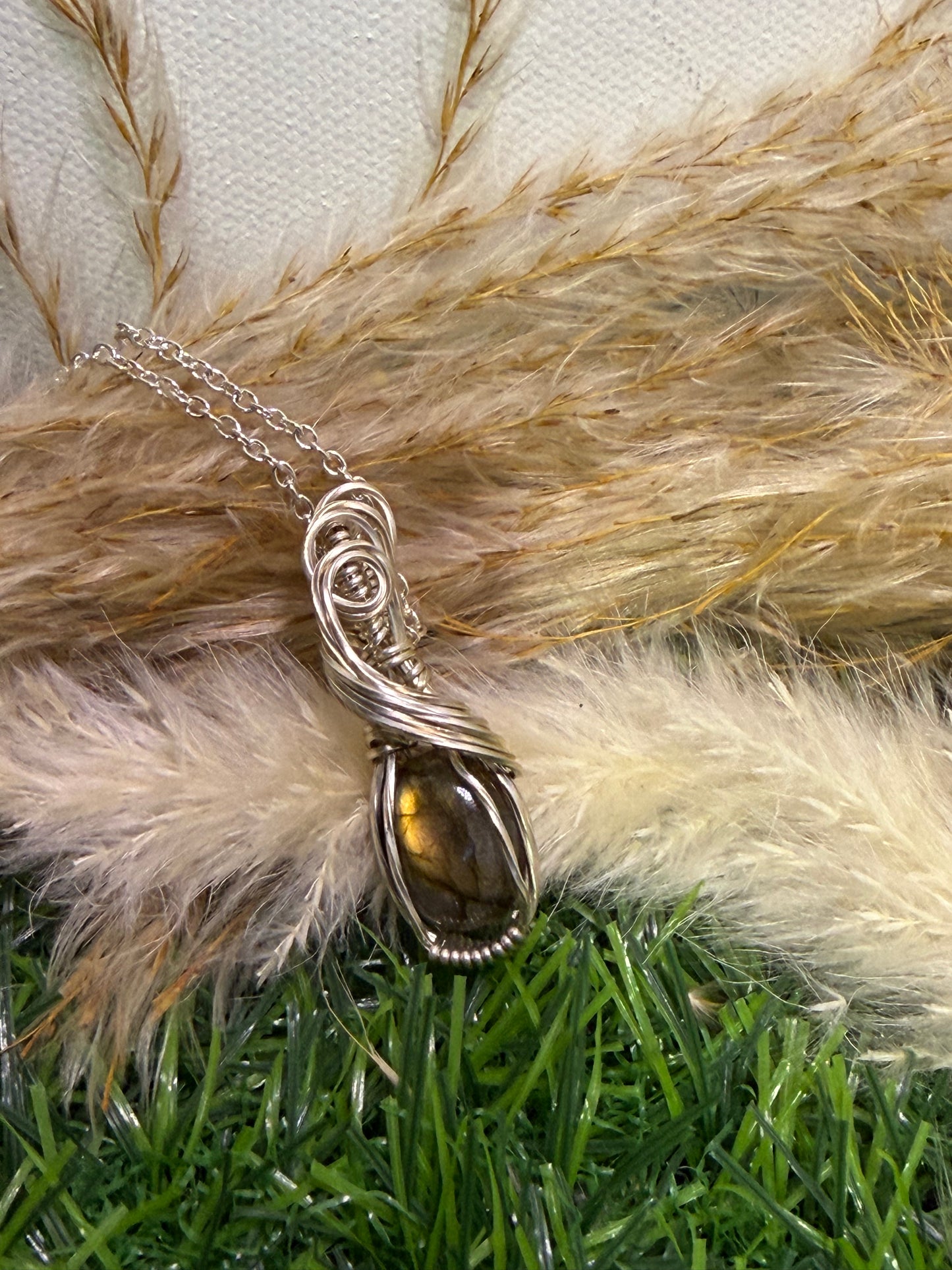 Labradorite pendent wrapped in 9.25 Serling silver