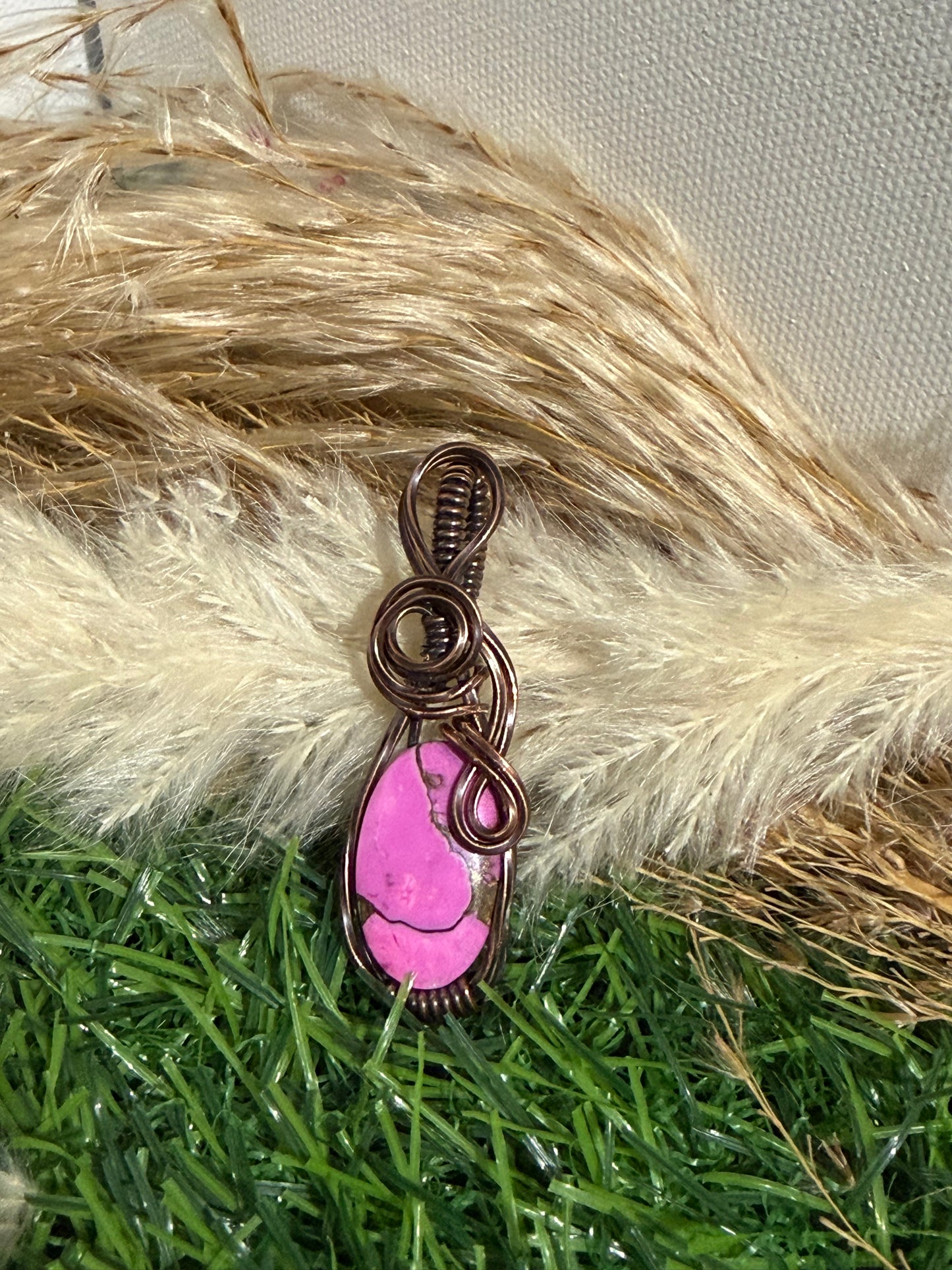 Cotton Candy Mohave pendant wrapped in oxidized copper