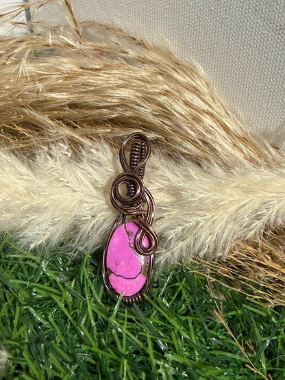 Cotton Candy Mohave pendant wrapped in oxidized copper