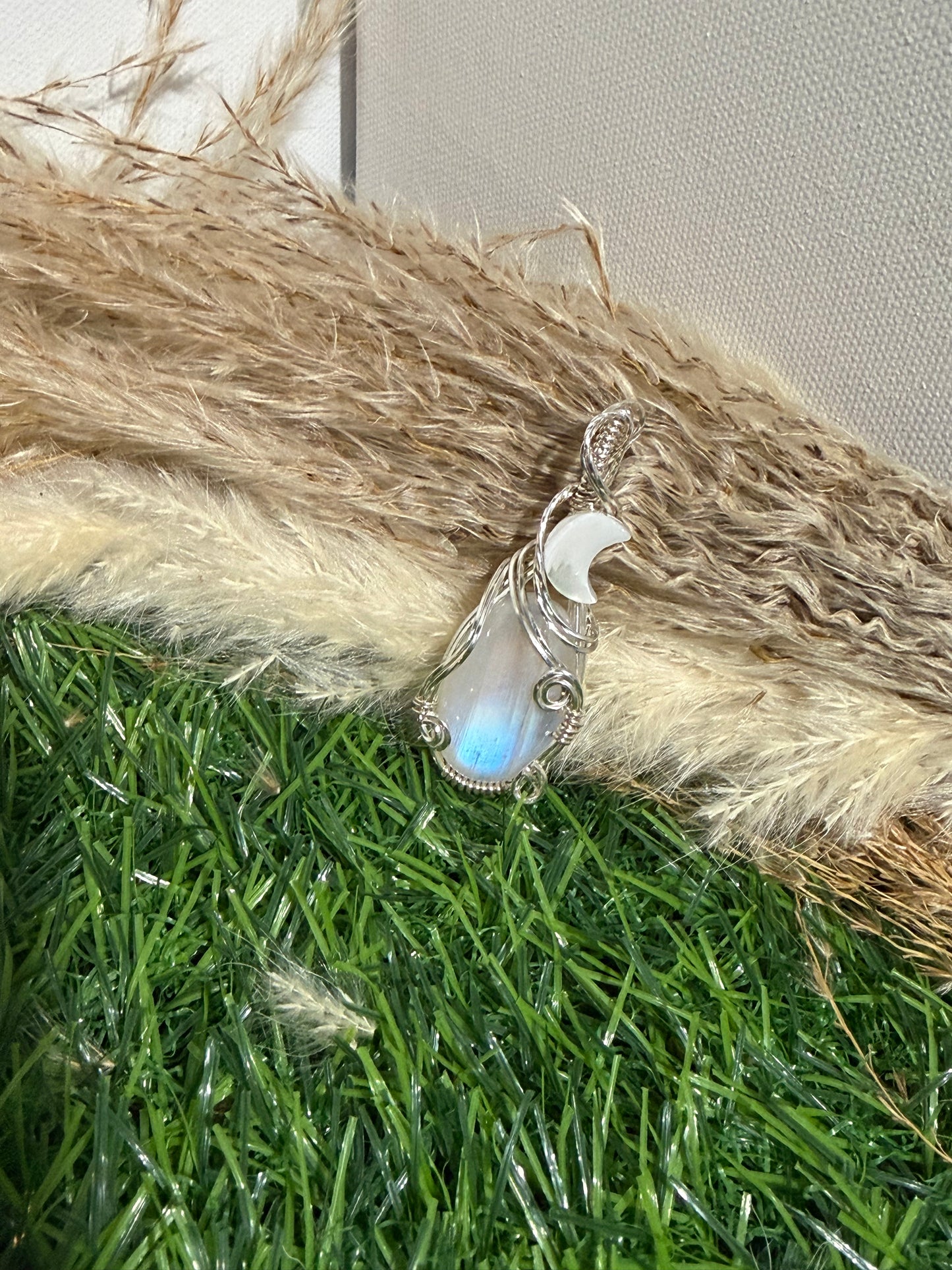 Moonstone pendant wrapped in 9.25 Sterling Silver