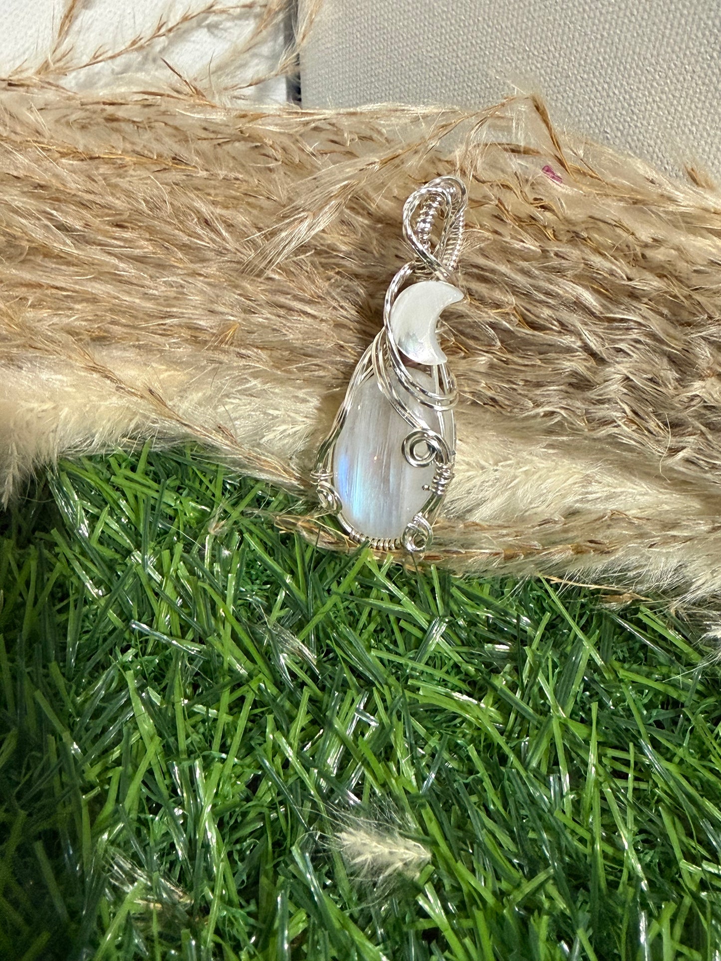 Moonstone pendant wrapped in 9.25 Sterling Silver