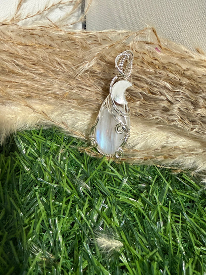 Moonstone pendant wrapped in 9.25 Sterling Silver