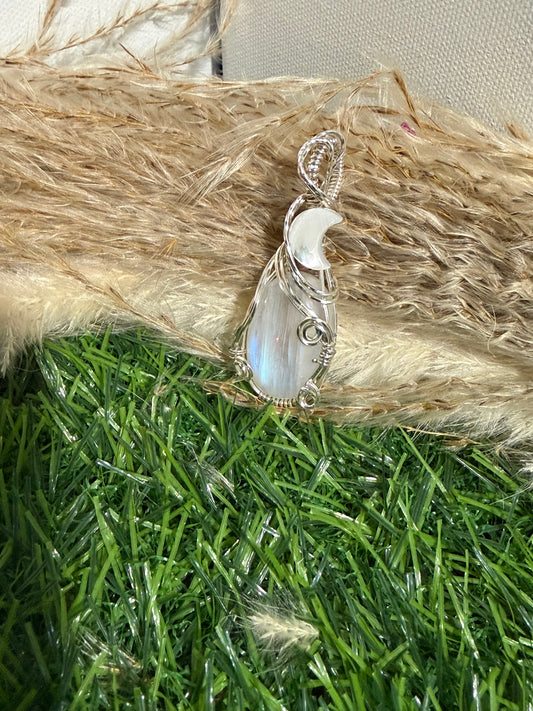 Moonstone pendant wrapped in 9.25 Sterling Silver