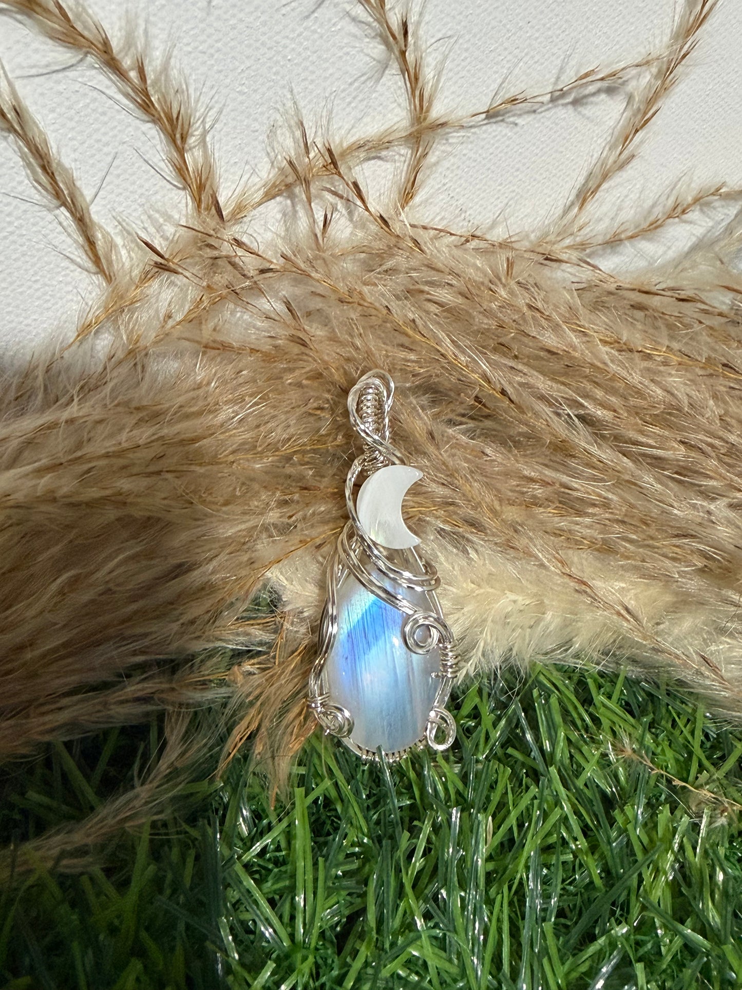 Moonstone pendant wrapped in 9.25 Sterling Silver