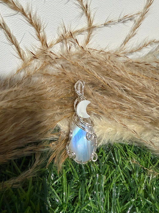 Moonstone pendant wrapped in 9.25 Sterling Silver