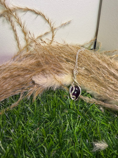 Amethyst Pendant wrapped in 9.25 Sterling Silver