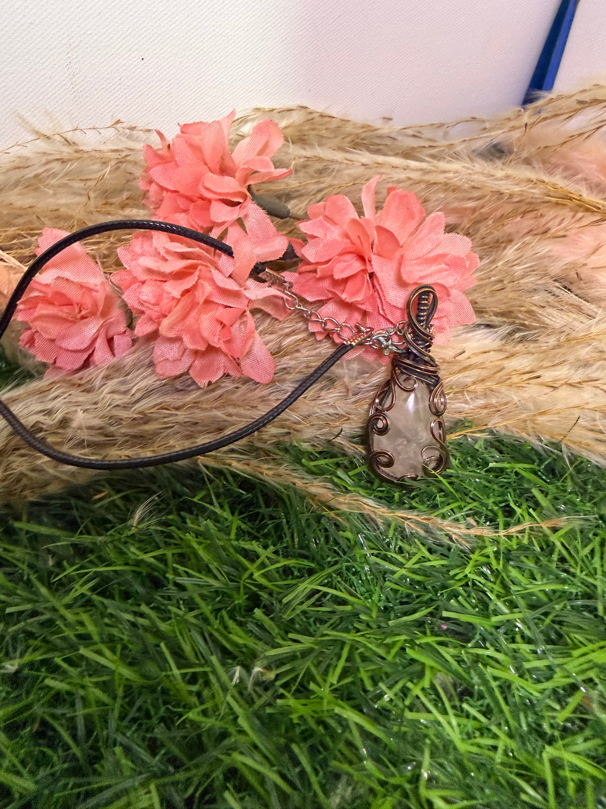 Kammererite pendant wrapped in oxidized Copper