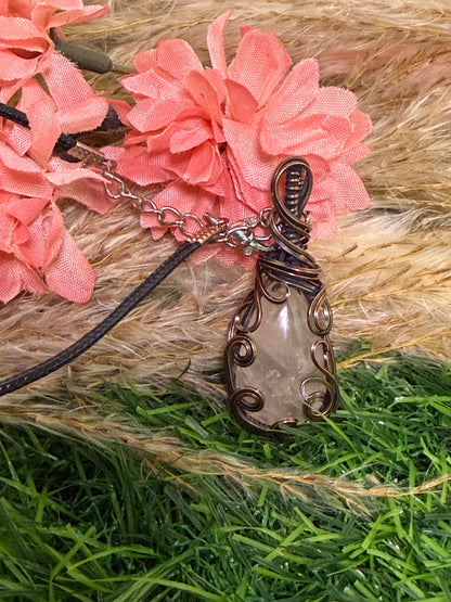 Kammererite pendant wrapped in oxidized Copper