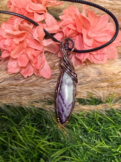 Kammererite pendant wrapped in oxidized Copper
