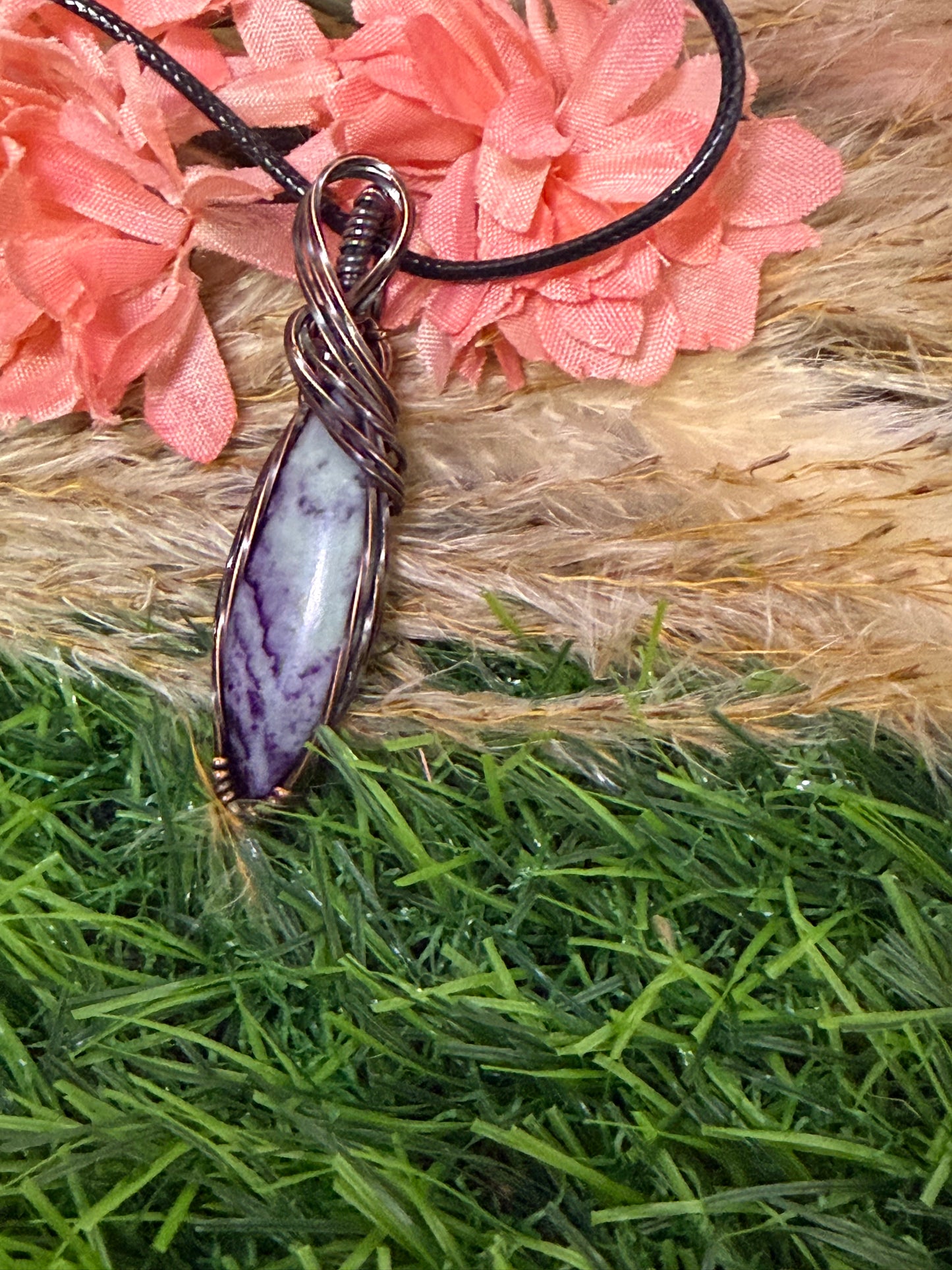 Kammererite pendant wrapped in oxidized Copper