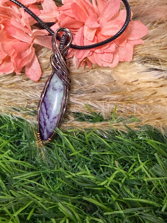 Kammererite pendant wrapped in oxidized Copper