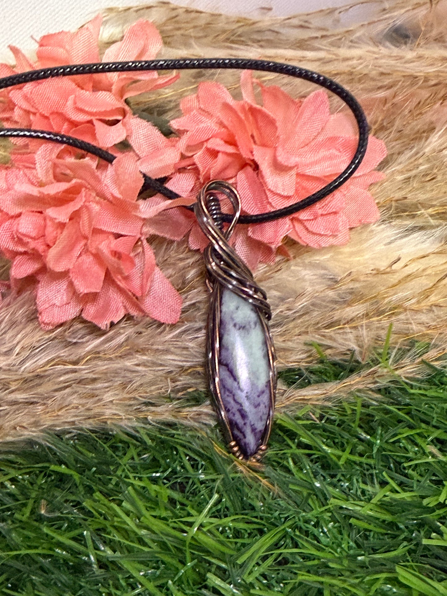 Kammererite pendant wrapped in oxidized Copper