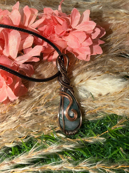 Moss Agate wrapped in oxidized Copper