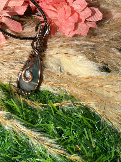 Moss Agate wrapped in oxidized Copper