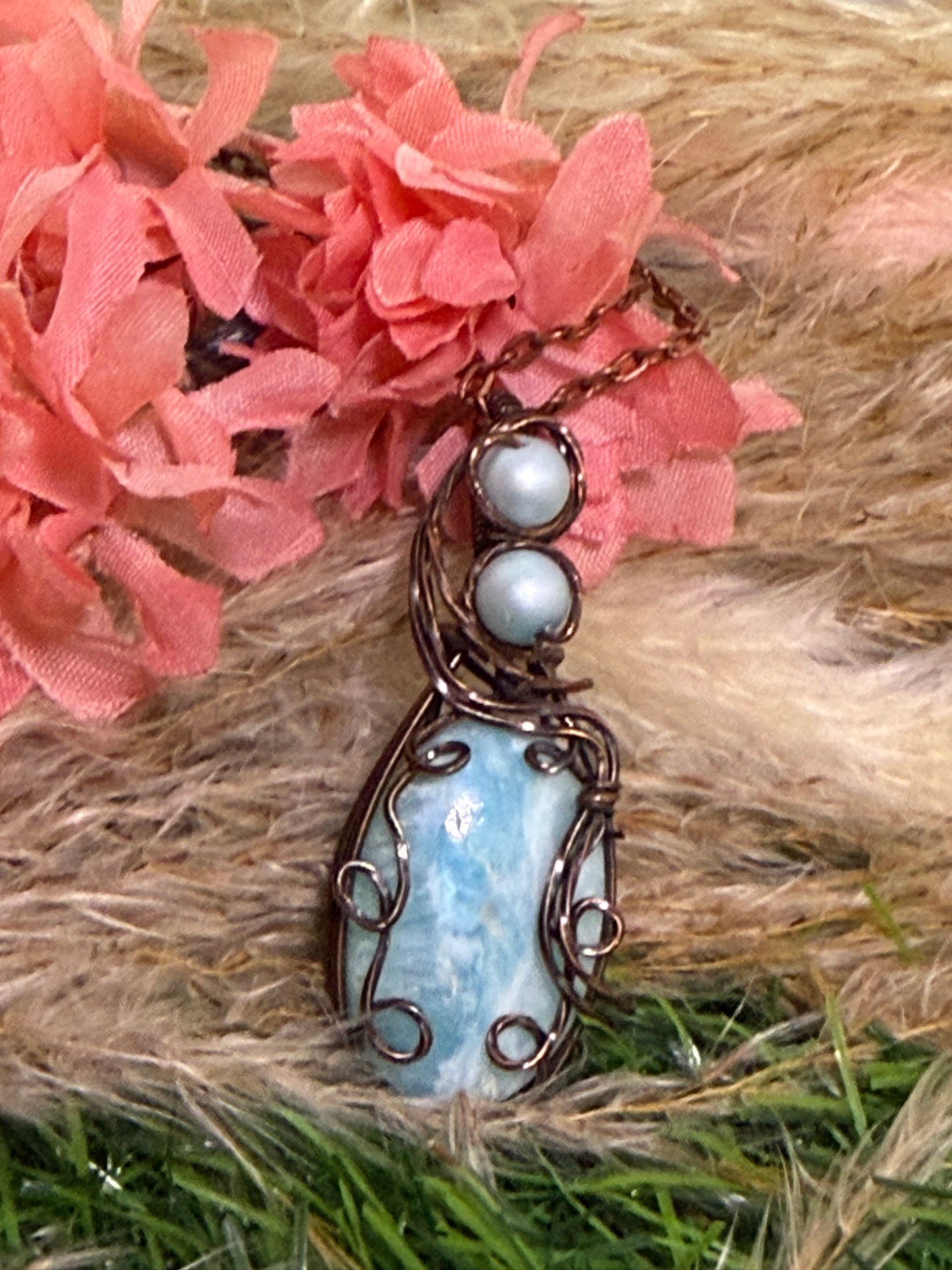 Caribbean Calcite pendant wrapped in oxidized copper