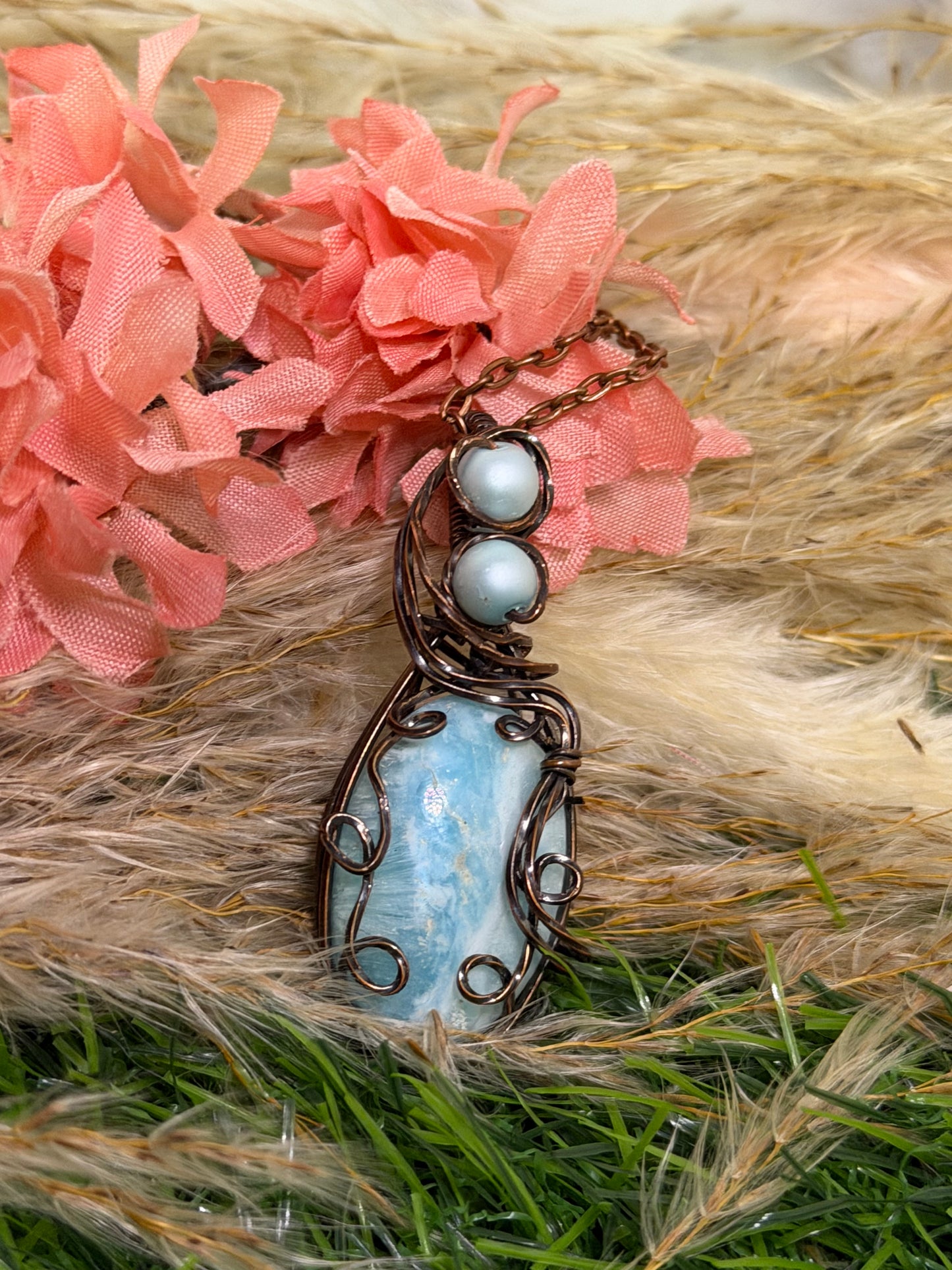 Caribbean Calcite pendant wrapped in oxidized copper