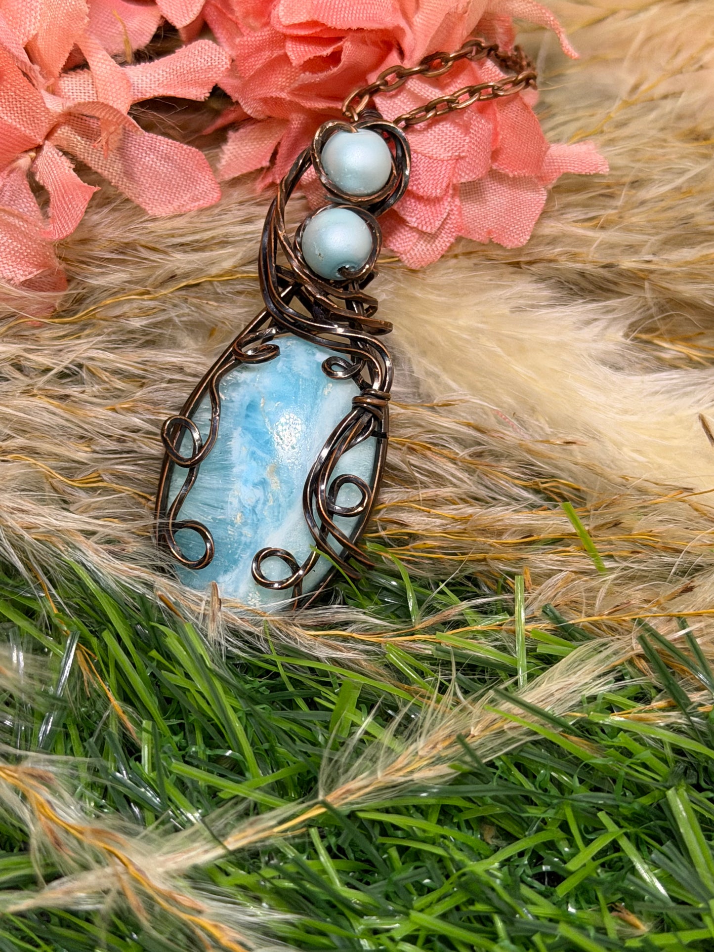 Caribbean Calcite pendant wrapped in oxidized copper