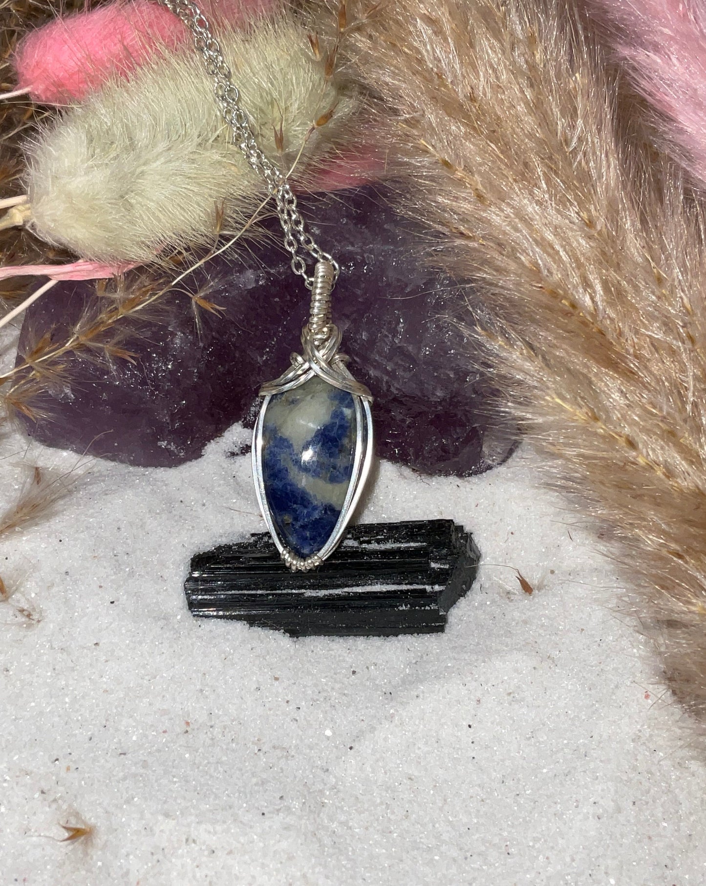 Sunset Sodalite wrapped in Sterling Silver/