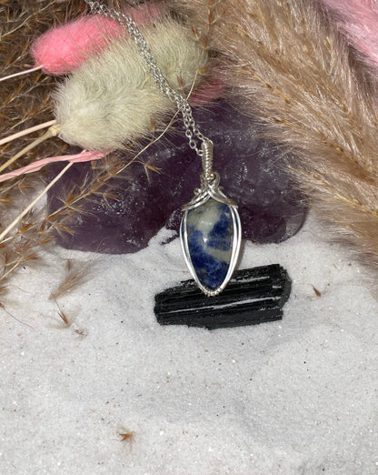 Sunset Sodalite wrapped in Sterling Silver/