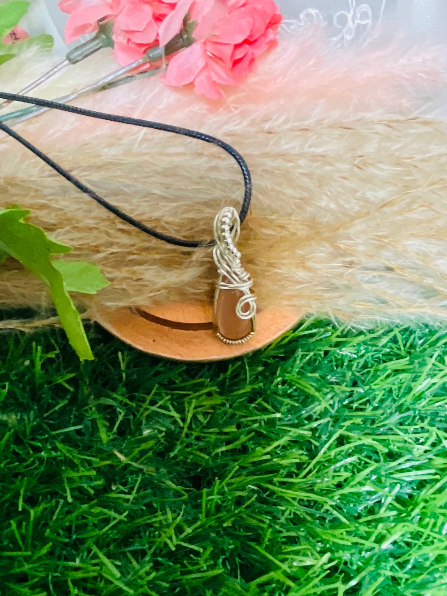 Peach Moonstone pendant wrapped in Sterling Silver