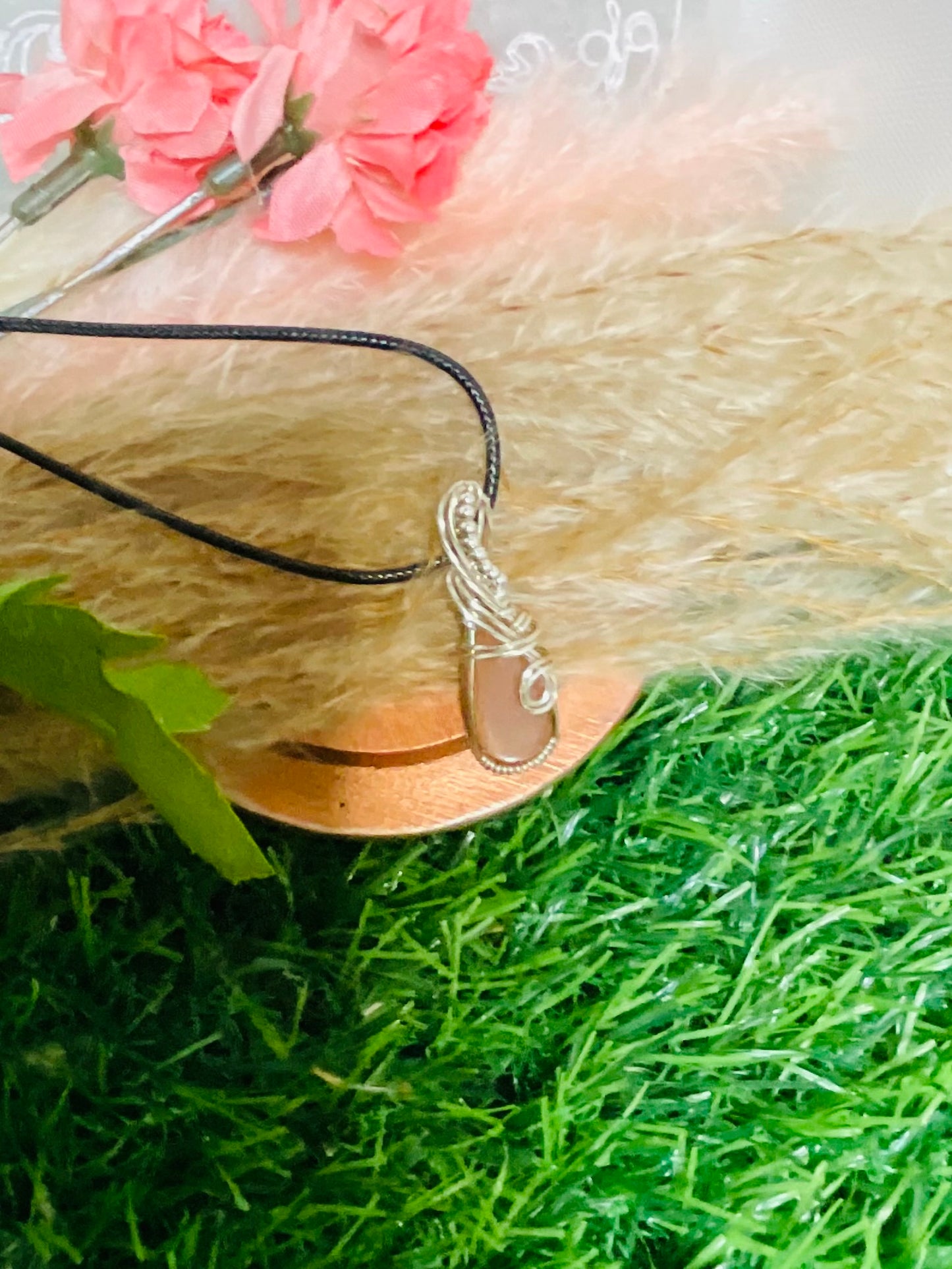 Peach Moonstone pendant wrapped in Sterling Silver