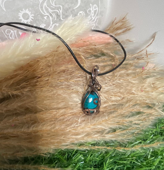 Chrysocolla pendant Wrapped in Antique Copper