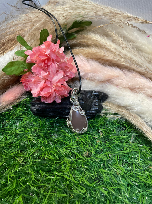 Rainbow Lattice Moonstone wrapped in Sterling Silver