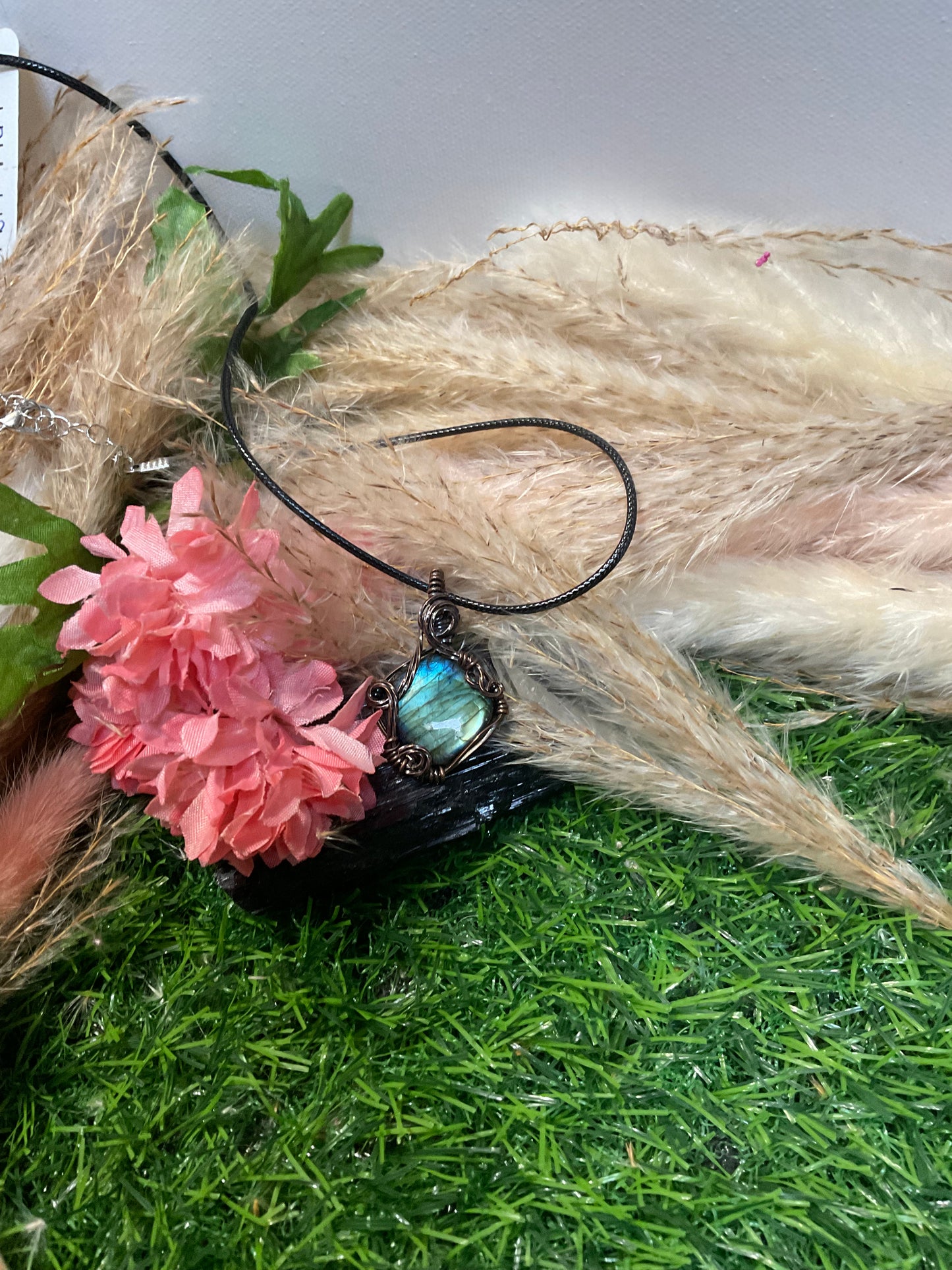 labradorite wrapped in Oxidized copper