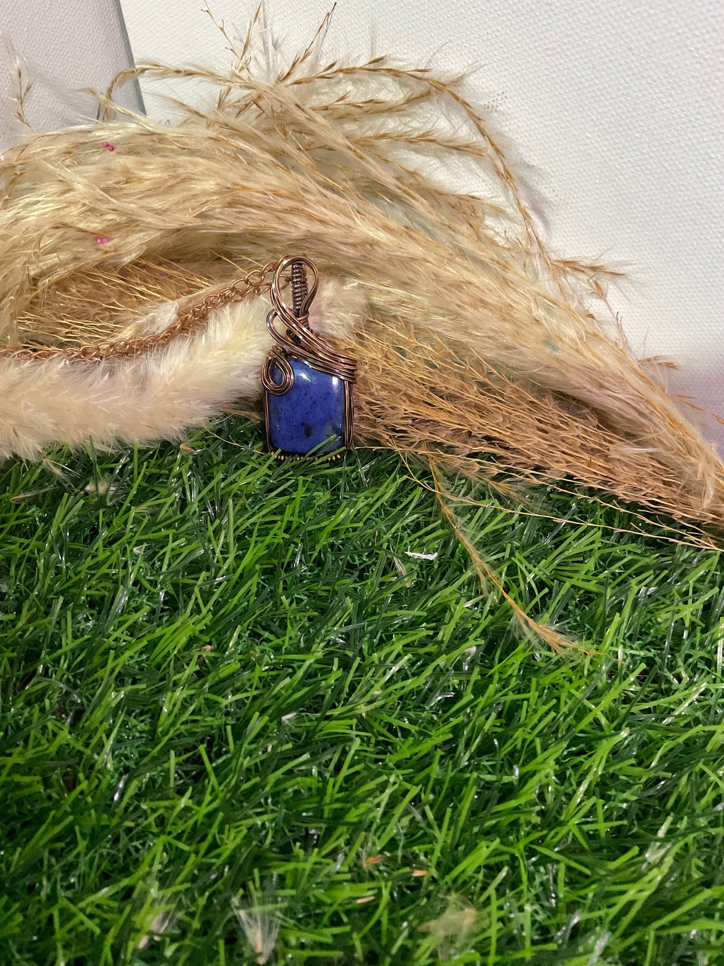 Dumortierite pendant wrapped in Oxidized Copper