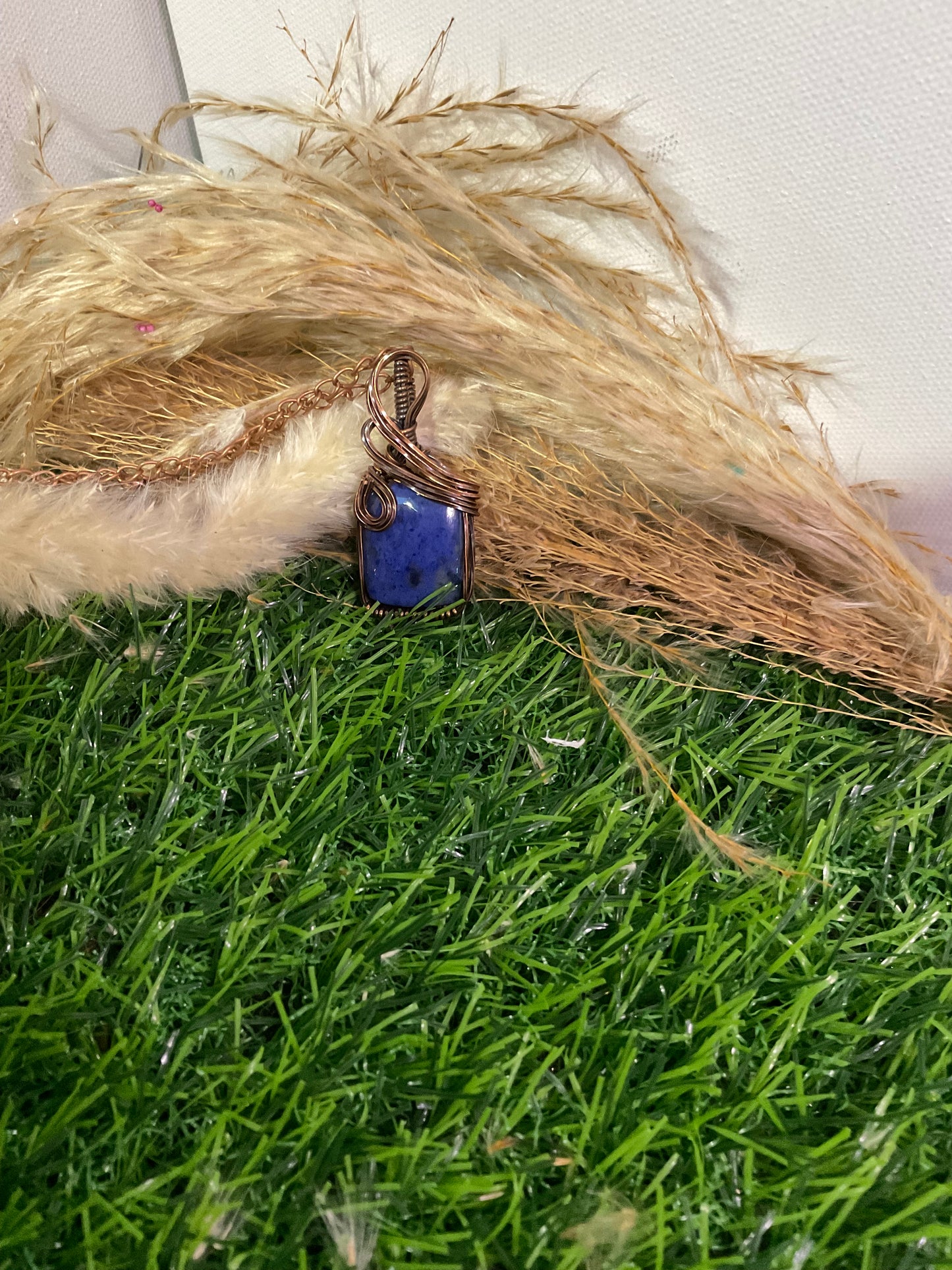 Dumortierite pendant wrapped in Oxidized Copper