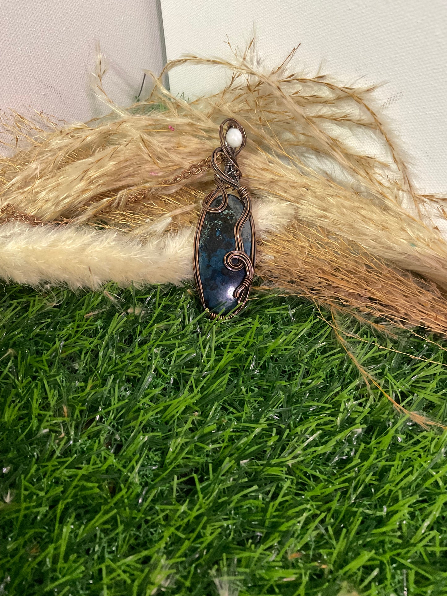 Chrysolite Pendant wrapped in oxidized copper