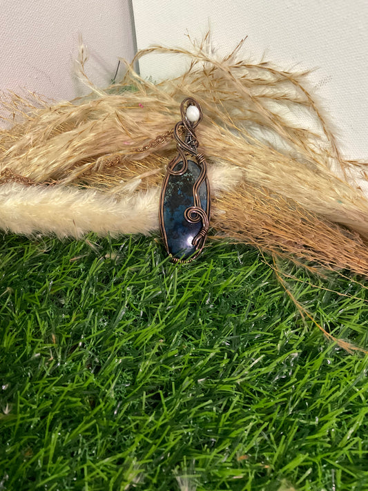 Chrysolite Pendant wrapped in oxidized copper