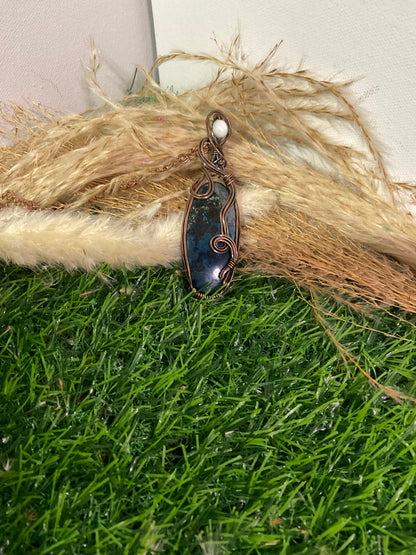 Chrysolite Pendant wrapped in oxidized copper