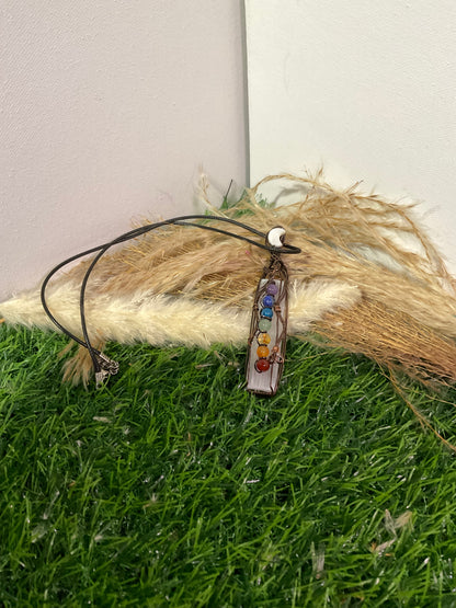 Chakra necklace with selenite wrapped in oxidized copper