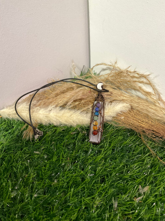 Chakra necklace with selenite wrapped in oxidized copper