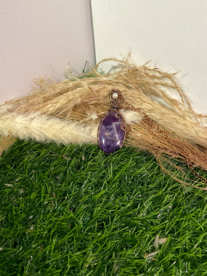 Amethyst Pendant wrapped in oxidized copper