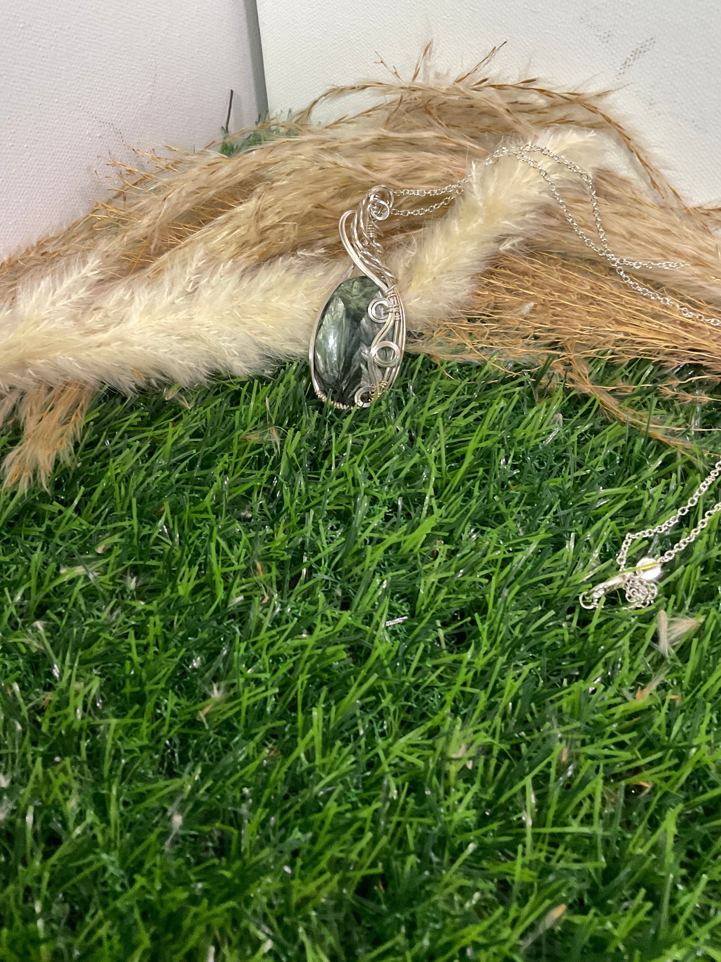 Serpentine pendant wrapped in 9.25 Sterling Silver