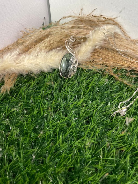 Serpentine pendant wrapped in 9.25 Sterling Silver
