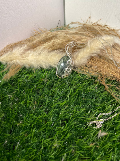 Serpentine pendant wrapped in 9.25 Sterling Silver
