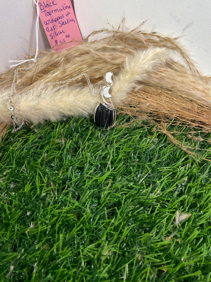 Black Tourmaline wrapped in 9.25 Sterling Silver with moon beads