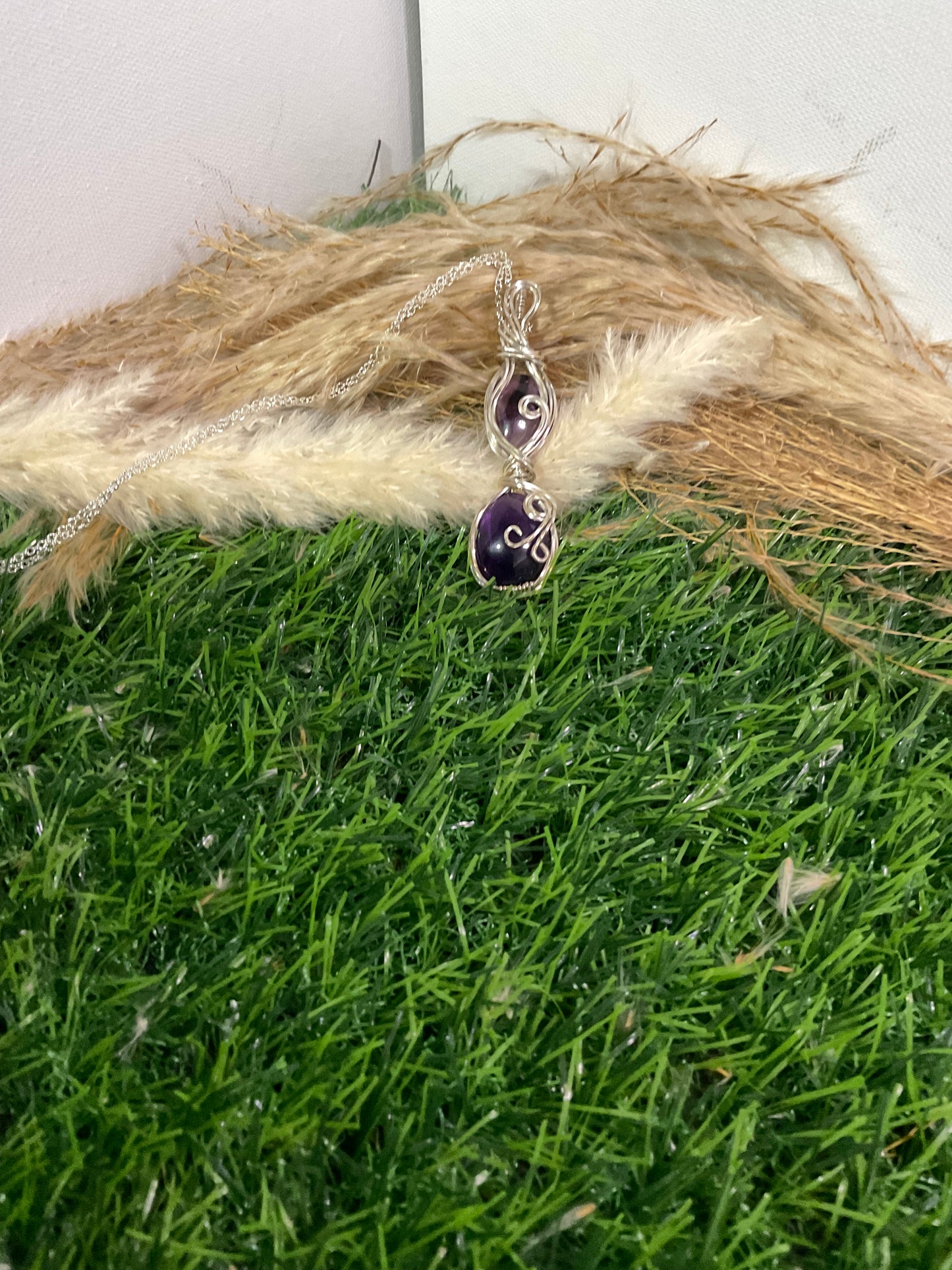 Double Amethyst pendant wrapped in Sterling Silver