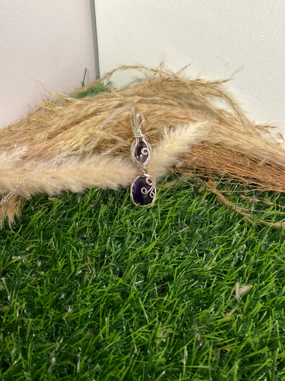 Double Amethyst pendant wrapped in Sterling Silver