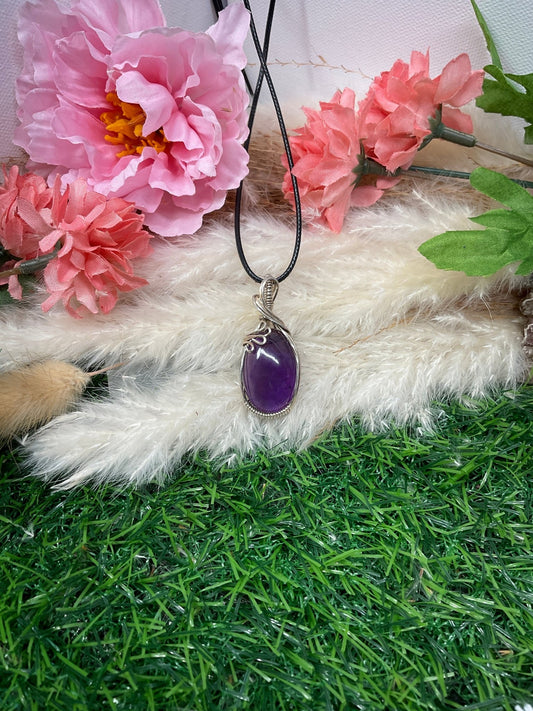 Amethyst Crystal wrapped in Sterling Silver. - Daydream Designs